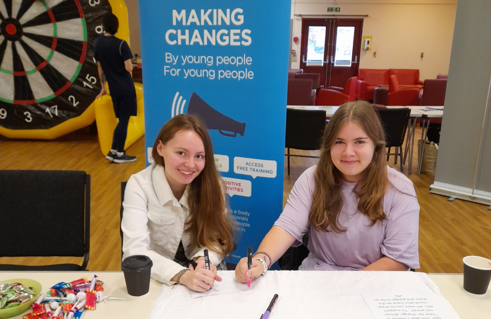 Young people sat at a Broadland YAB stall