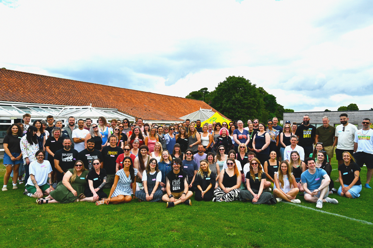 The entire MAP staff sitting and standing variously on a green field, with a blue sky behind them. Jonny looks particularly dashing, but it's a pretty nice picture of all concerned, so perhaps wrong to pick favourites. 
