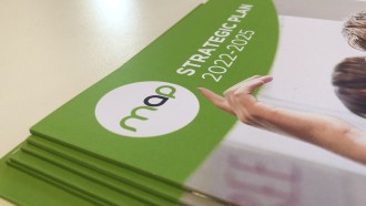 A stack of copies of MAP's strategic plan document