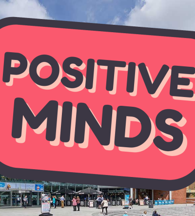An image of the forum in Norwich on a summer's day, with the Positive Minds banner superimposed over it.