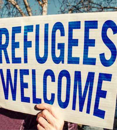 A placard reading 'refugees welcome'