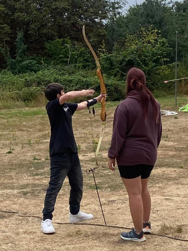 Young person practicing archery